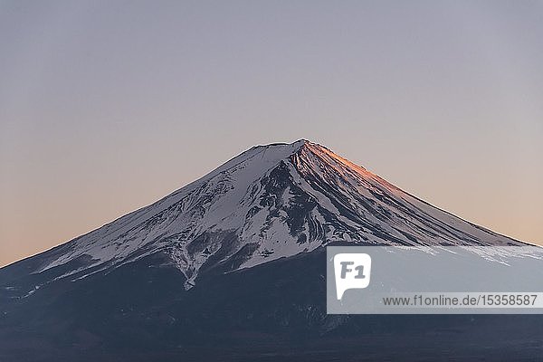 Sunset  view of the summit of the volcano Mt Fuji  Yamanashi Prefecture  Japan  Asia