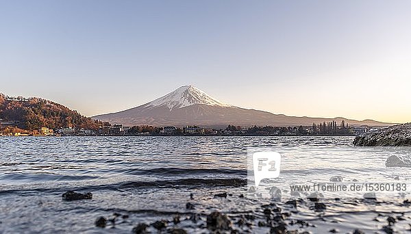 Evening atmosphere  shore with waves  view over Lake Kawaguchi to volcano Mt. Fuji  Yamanashi Prefecture  Japan  Asia