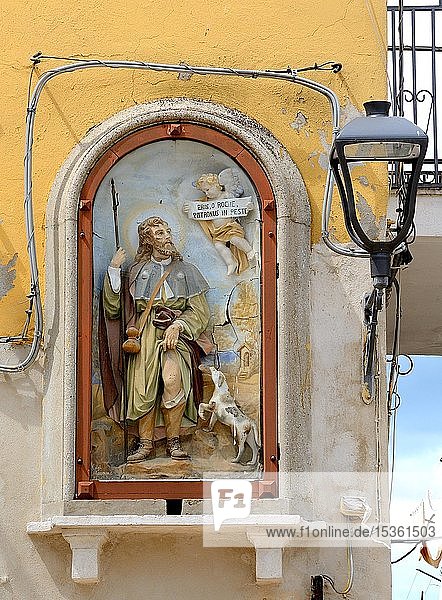 Malerei des Schutzpatrons an einer Wand mit Stromkabeln Bernalda Region Basilikata Italien Europa