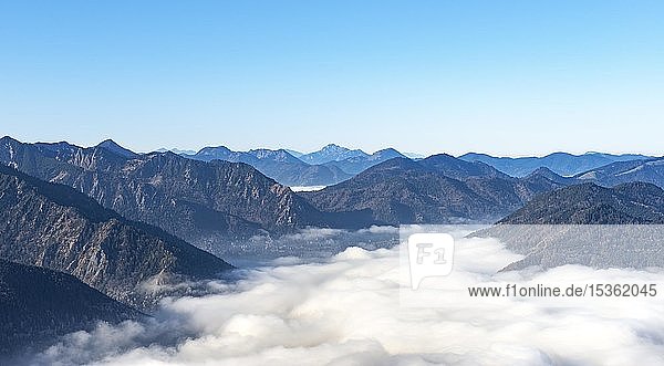 View from the hiking trail to the summit of the Breitenstein  clouds over the valley  alpine panorama  Fischbachau  Bavaria  Germany  Europe