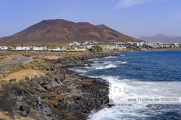 Rugged coast with volcano Montana Roja  Playa Blanca  Lanzarote  Canary Islands  Spain  Europe