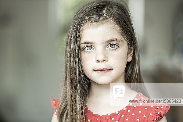 6-year-old girl looks into the camera  Portrait  Germany  Europe