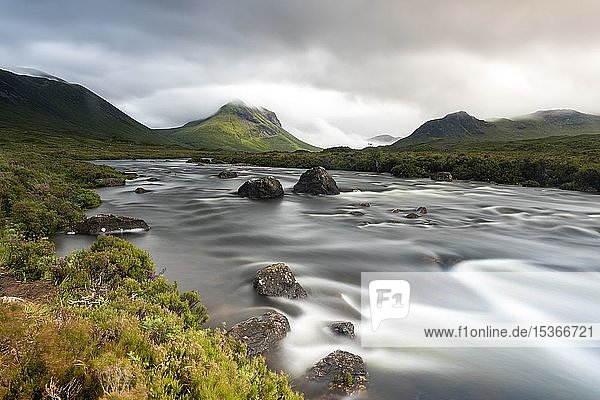 River course River Sligachan back mountains in clouds Isle of Skye Scotland