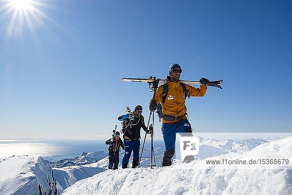 Ski mountaineers on the ascent to Rundfjellet  Svolvaer  Austvågøy  Lofoten  Norway  Europe