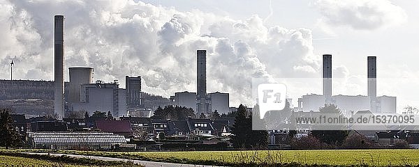 Housing estate in front of the lignite-fired power plant Frimmersdorf  Grevenbroich  Rhineland lignite mining area  coal phase-out  North Rhine-Westphalia  Germany  Europe