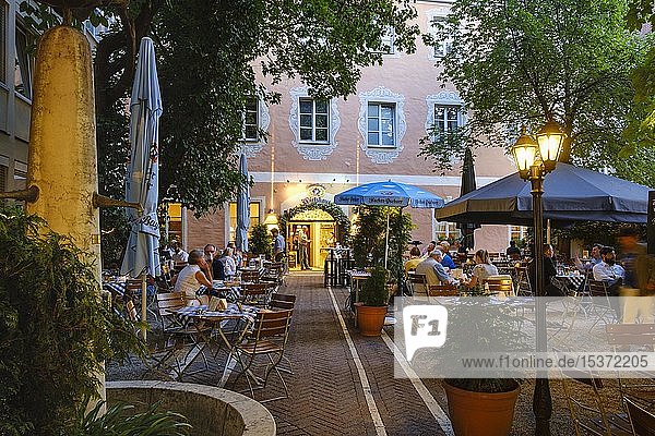 Hacker-Pschorr beer garden in the old Augustinian monastery old town Regensburg Upper Palatinate Bavaria Germany Europe