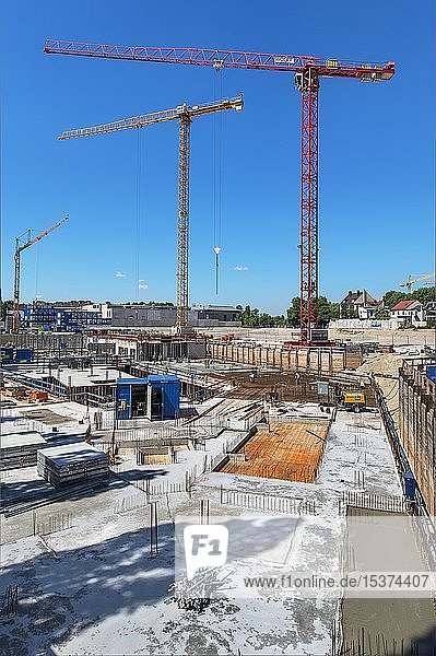 Construction cranes at major construction site  Au  Munich  Upper Bavaria  Bavaria  Germany  Europe