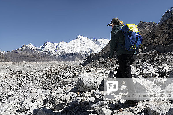 Young woman hiking in Sagarmatha National Park  Everest Base Camp trek  Nepal