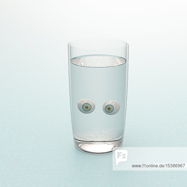 3D-Rendering  Starrende Augäpfel in einem Glas Wasser