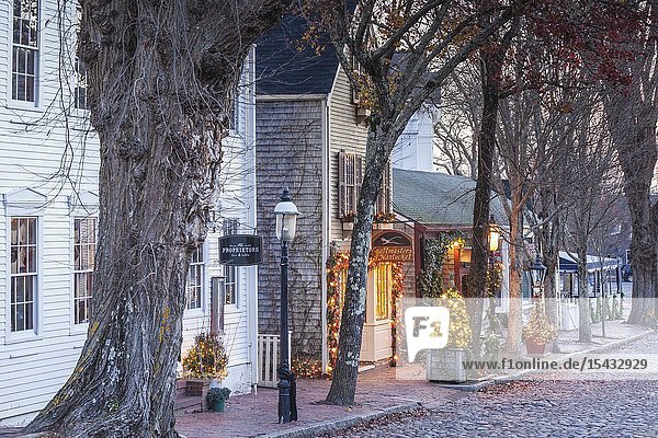 USA New England Massachusetts Nantucket Island Nantucket Town storefront Christmastime.