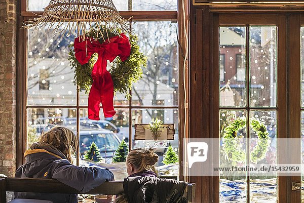 USA New England Massachusetts Nantucket Island Nantucket Town interior of cafe with Christmas decarations NR.