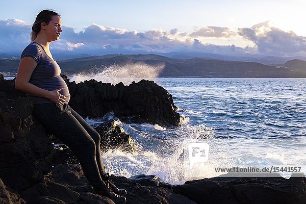Pregnant woman enjoying the coastline of Las Palmas Canary Islands.