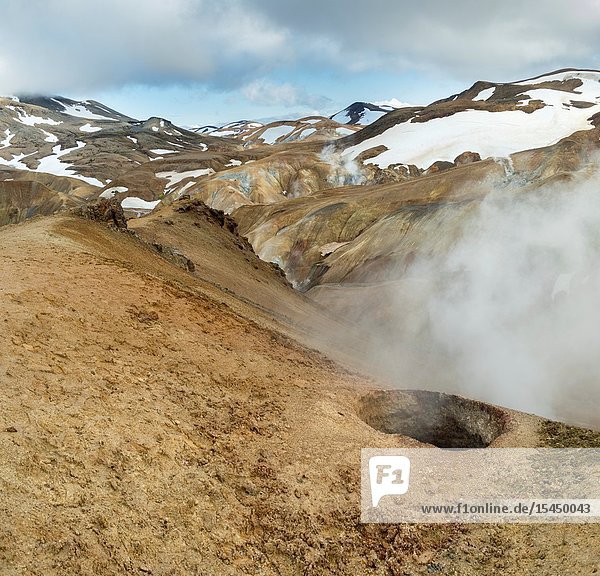 Hikers in the geothermal area Hveradalir in the mountains Kerlingarfjoell in the highlands of Iceland. Europe  Northern Europe  Iceland  August.