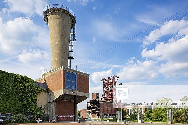 Gelsenkirchen Bismarck D-Gelsenkirchen D-Gelsenkirchen-Bismarck Ruhr area Westphalia North Rhine-Westphalia NRW former coalmine Consolidation 3/4/9 of the Ruhrkohle AG shaft mine Consol hard coal mine ahead the mine fan with diffuser behind pit tower shaft 9 and machine hall in the Consol Park central hoisting shaft industrial monument Route of Industrial Heritage *** Local Caption ***.