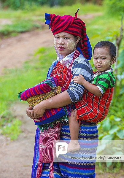 Intha tribe woman with her child in Inle lake Myanmar.