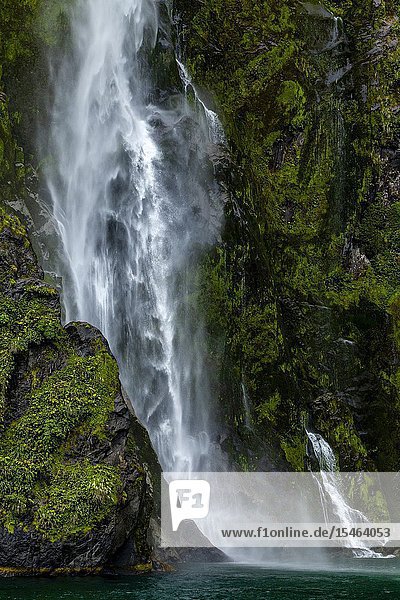 A Beautiful Waterfall Seen From A Milford Sound Cruise Boat, Fiordland National Park, South Island, New Zealand.