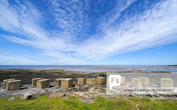 Aerial view of Second World War era anti-tank blocks on shore at Gosford Sands at Longiddry in East Lothian Scotland UK.