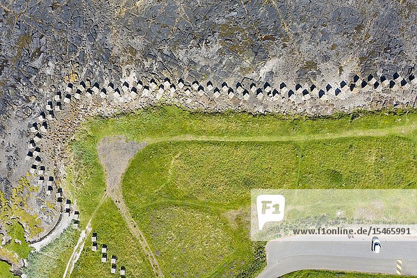 Aerial view of Second World War era anti-tank blocks on shore at Gosford Sands at Longiddry in East Lothian Scotland UK.