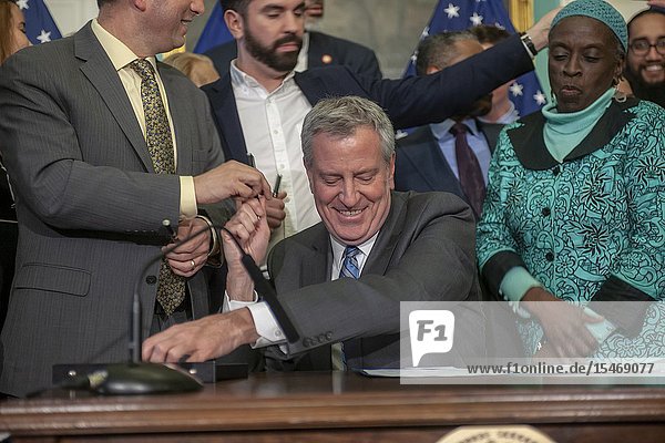 New York Mayor Bill de Blasio at a bill signing in New York City Hall on Monday March 4 2019. The mayor signed into law legislation that creates a pilot program in East New York (Intro. 1004-A) that creates a pathway to the legalization of basement and cellar apartments known in the vernacular as 'illegal 3's'. The basement apartments have to comply or be renovated to comply with the modified building code. (© Richard B. Levine).