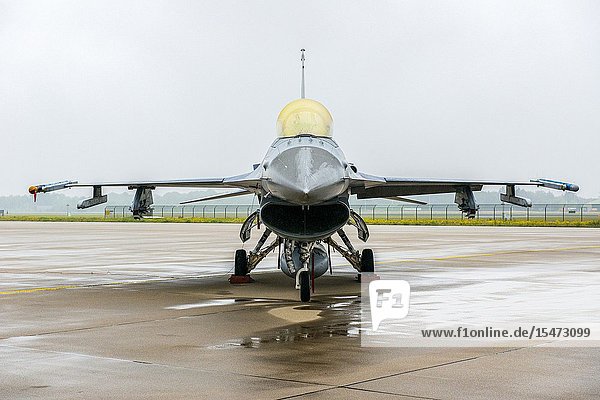 Eindhoven Netherlands. F16 Fighting Falcon jet parked on the Eindhoven Welschap airforce base waiting to be deployed.