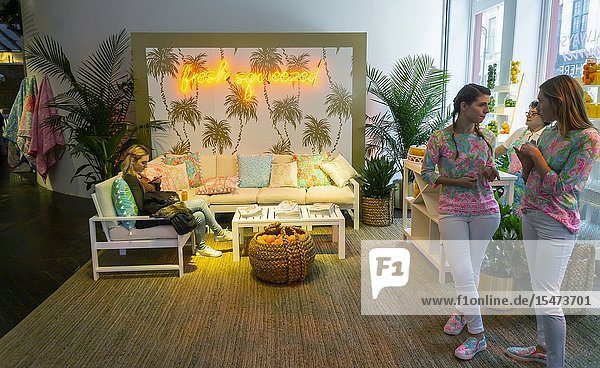 Visitors mingle with workers dressed in Lilly Pulitzer designs at the Lilly Pulitzer for Pottery Barn collaboration pop-up in Soho in New York on Thursday March 14 2019. The collaboration puts Lilly Pulitzer's Palm Beach style designs onto iconic Pottery Barn home goods. The pop-up is entitled the 'Palm Beach Experience' and serves as a preview for the merchandise going on sale online at midnight. (© Richard B. Levine).