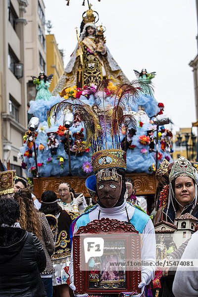 Procession of the Virgen del Carmen of Paucartambo (Cusco) characters and typical costumes. Peru South America.