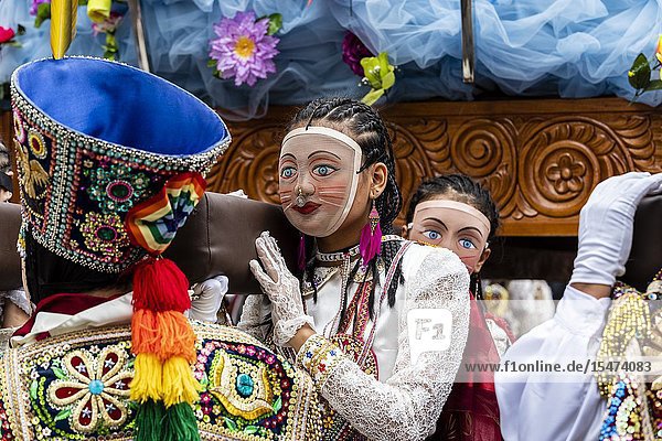 Procession of the Virgen del Carmen of Paucartambo (Cusco) characters and typical costumes. Peru South America.