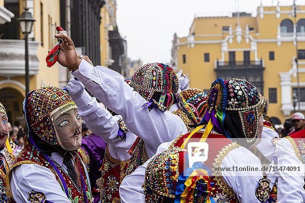 Procession of the Virgen del Carmen of Paucartambo (Cusco) characters and typical costumes. Peru South America.