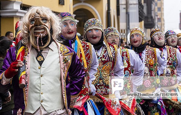 Procession of the Virgen del Carmen of Paucartambo (Cusco) characters and typical costumes. Peru South America.