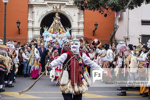 Procession of the Virgen del Carmen of Paucartambo (Cusco) characters and typical costumes. Peru South America.