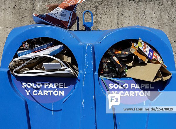 Recycling containers for paper and cardboard in street on Gran Canaria Canary Islands Spain.