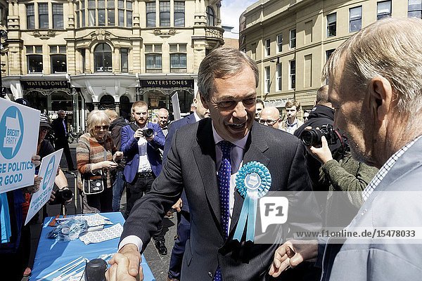 Newcastle upon Tyne UK. 20th May 2019. UK. Nigel Farage chats to supporters and members of the public minutes before having a milkshake thrown over him while campaigning for the Brexit party in Newcastle city centre.