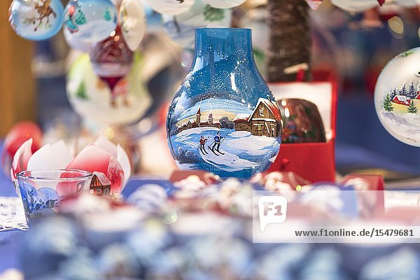 A detail of hand painted Christmas balls into the traditional Christmas Markets in South Tyrol Bolzano province Trentino Alto Adige Italy.