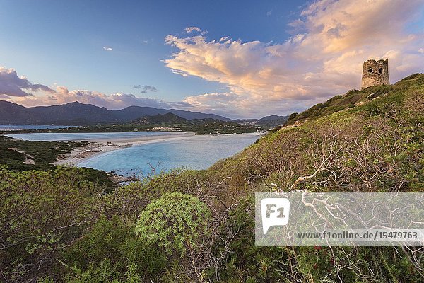 View of the beach of Porto Giunco and the Notteri pond at sunset from the old tower of Capo Carbonara Villasimius Cagliari Sardinia Italy Europe.