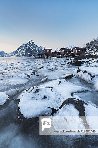 Reine Bay at sunset in winter. Reine Nordland county Northern Norway Norway.