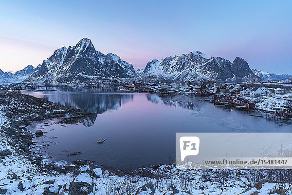 Reine Bay at sunset in winter. Reine Nordland county Northern Norway Norway.