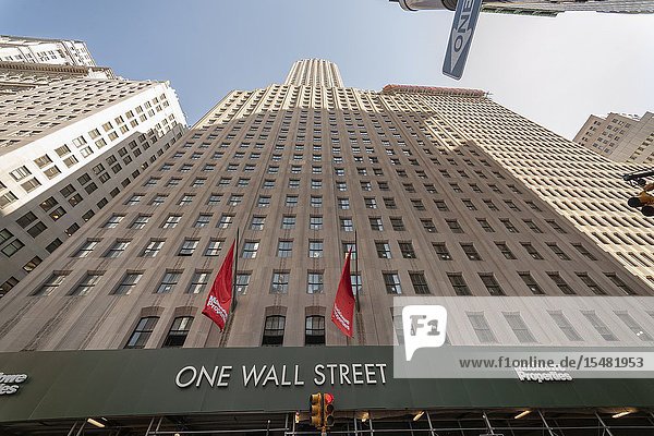 Originally the Irving Trust Building and now the BNY Mellon Building the art deco skyscraper One Wall Street is seen on Wednesday April 3 2019. The building is currently being converted into a residential condominium with ground-floor retail by Macklowe Properties with partners. (© Richard B. Levine).