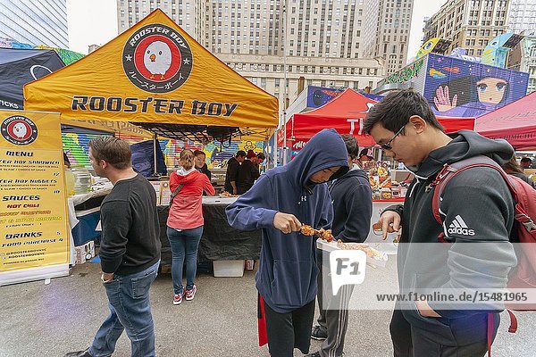 Tourists and workers in Downtown Manhattan flock to the latest iteration of the popular Smorgasburg located outside the Oculus on opening day Friday August 12 2019. The marketplace features prepared and artisanal foods by small entrepreneurs. After a one-day trial run last year the popular food court will open every Friday to feed the hungry masses in Lower Manhattan until at least October. (© Richard B. Levine).
