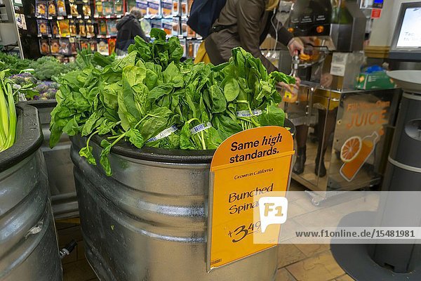 Signs in a Whole Foods Market in the Chelsea neighborhood of New York on Wednesday April 3 2019 tout the chain's commitment to shedding its 'Whole Paycheck' image and is lowering prices on over 500 items. The lower pricing started today and will average 20 percent on select items. (© Richard B. Levine).