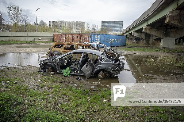 Abandoned vehicles around Flushing Creek in the Flushing neighborhood of Queens in New York on Saturday April 20 2019. (© Richard B. Levine).