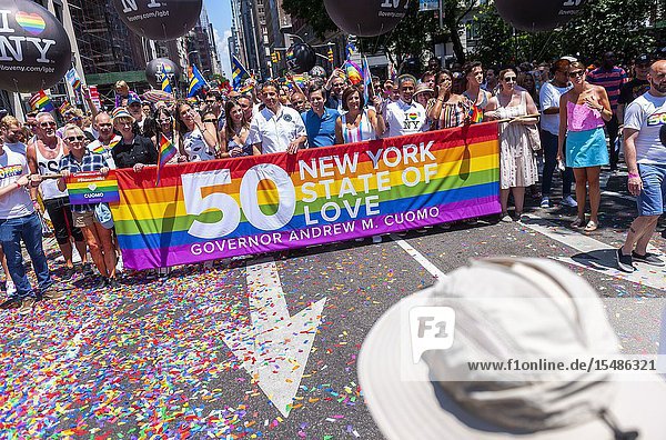 New York State Governor Andrew Cuomo with family joins 150 000 marchers and millions of spectators at the Stonewall 50/ World Pride Parade in New York on Sunday June 30 2019. The parade commemorates to 50th anniversary of the Stonewall riots which are considered the seminal rise in the gay rights movement. (© Richard B. Levine).