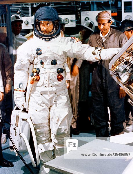 Astronaut James A. McDivitt commander of the Apollo 9 prime crew stands by to participate in crew compartment fit and function test activity at North American Rockwell.