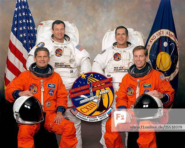 These four astronauts are in training for the STS-113 mission  scheduled this autumn to take up the sixth crew to the International Space Station (ISS) and bring back the members of the fifth expedition  as well as perform a variety of other duties. In front are astronauts James D. Wetherbee (right) and Paul S. Lockhart  commander and pilot  respectively. Attired in training versions of the extravehicular mobility unit (EMU) space suits are astronauts Michael E. Lopez-Alegria (left) and John B. Herrington  both mission specialists.
