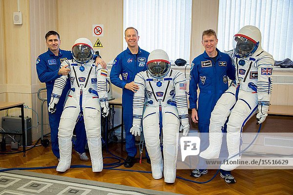In the Integration Facility at the Baikonur Cosmodrome in Kazakhstan Expedition 46-47 crewmember Tim Peake of the European Space Agency suits up during a fit check dress rehearsal Dec. 1. Peake Tim Kopra of NASA and Yuri Malenchenko of the Russian Federal Space Agency (Roscosmos) will launch Dec. 15 from Baikonur in the Soyuz TMA-19M spacecraft for a six-month mission on the International Space Station. NASAVictor Zelentsov