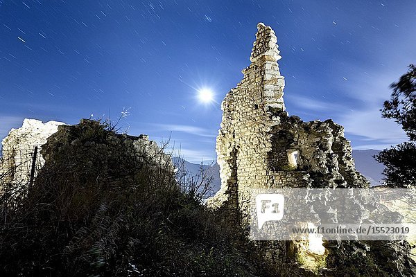 Night at medieval ruins of Penede Castle. Nago-Torbole Trento province Trentino Alto-Adige Italy Europe.