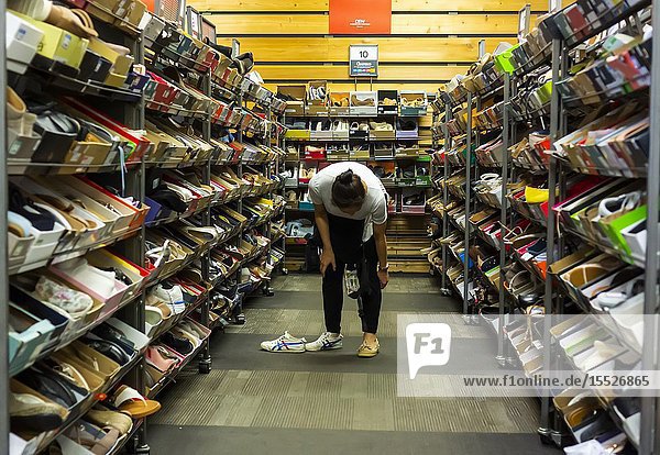 Shoppers in a DSW shoe store in Herald Square in New York on Friday August 2 2019. Footwear is expected to be a victim of the escalating trade war with China as 70% of shoes sold in the U. S. are imported from China. (© Richard B. Levine).