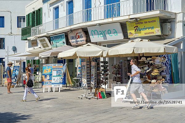 Shops in the street of Adamas Milos island Cyclades Greece