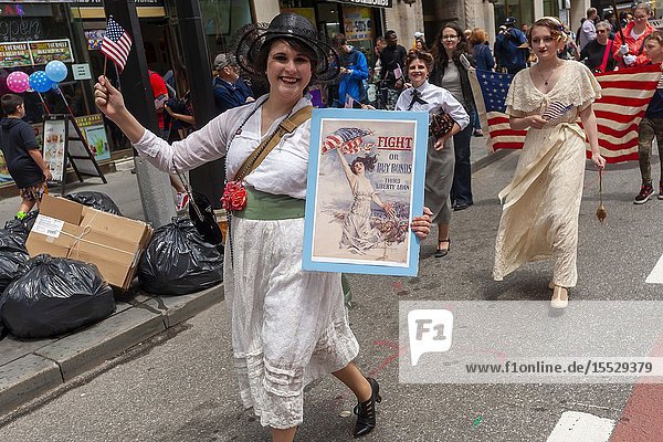 Members of the reenactment group the East Coast Doughboys march in the annual Flag Day Parade in New York on Friday June 14 2019 starting at New York City Hall Park. Flag Day was created by proclamation by President Woodrow Wilson on June 14 1916 as a holiday honoring America's flag but it was not until 1949 when it became National Flag Day. The holiday honors the 1777 Flag Resolution where the stars and stripes were officially adopted as the flag of the United States. (© Richard B. Levine).