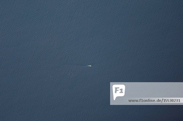 A lone ship navigating across the southern part of the Atlantic Ocean is photographed by crew members aboard the International Space Station. Photographs from the station record how the planet is changing over time from human-caused changes like urban growth and reservoir construction to natural dynamic events such as hurricanes floods and volcanic eruptions.