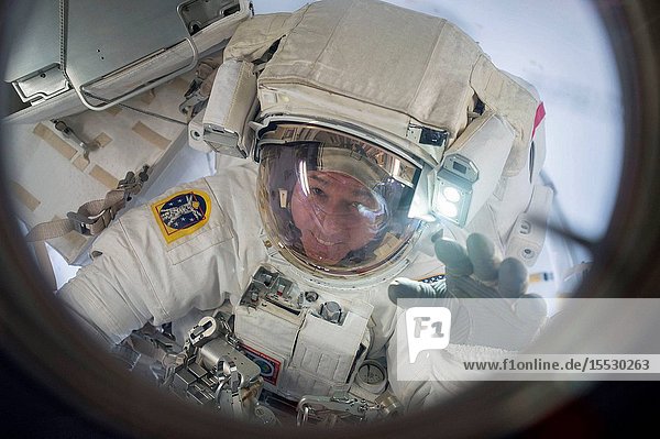 Expedition 50 Commander Shane Kimbrough of NASA is seen floating into the Quest airlock at the conclusion of a spacewalk. Kimbrough and Flight Engineer Thomas Pesquet of ESA (European Space Agency) conducted a six hour and 34 minute spacewalk on March 24 2017. The two astronauts successfully disconnected cables and electrical connections on the Pressurized Mating Adapter-3 to prepare for its robotic move lubricated the latching end effector on the Special Purpose Dexterous Manipulator extension for the Canadarm2 robotic arm inspected a radiator valve and replaced cameras on the Japanese segment of the outpost.